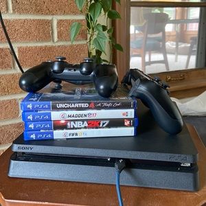 PlayStation 4 Slim 500gb with 4 games & 2 controllers